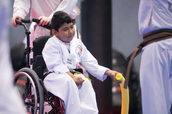 Inspiring-Possibilities-martial-arts-special-needs-boy-in-wheel-chair